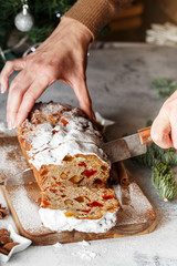 Stollen is fruit bread of nuts, spices, dried or candied fruit, coated with powdered sugar. It is traditional German bread eaten during the Christmas season. New year prep.