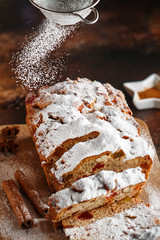 Stollen is fruit bread of nuts, spices, dried or candied fruit, coated with powdered sugar. It is traditional German bread eaten during the Christmas season. New year prep.