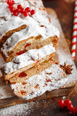 Stollen is fruit bread of nuts, spices, dried or candied fruit, coated with powdered sugar. It is traditional German bread eaten during the Christmas season. New year prep.