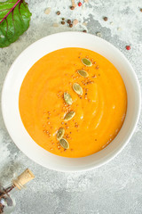 pumpkin soup (first course, delicious vegetable vitamin food) menu concept. food background. copy space. Top view
