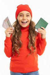 European girl with money and a passport in her hands screaming with joy on a white background