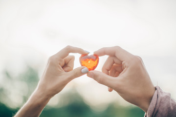 Couple hands red heart. Love concept. Red heart. Concept. Couple in love. Happy day. 