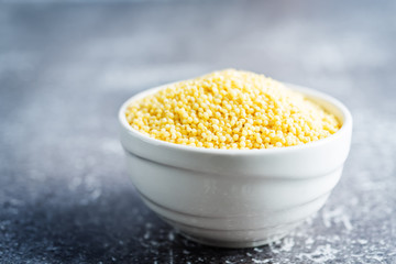 Dried millet porridge in the white bowl