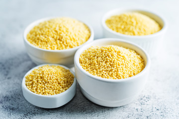 Dried millet porridge in the white bowl