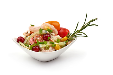 Seafood salad, shrimp, cucumber, cherry tomatoes, corn, isolated on a white background