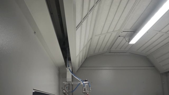 Automated spray booth on the production line.1920X1080 Full Hd.