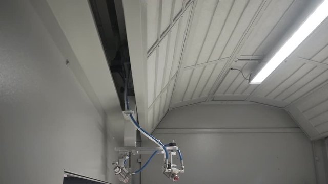Automatic spray booth in action.1920X1080 Full Hd.