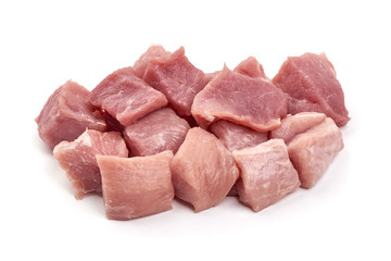 Raw pork pieces, isolated on white background