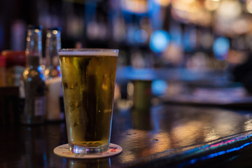 Fototapeta na wymiar glass of beer on bar