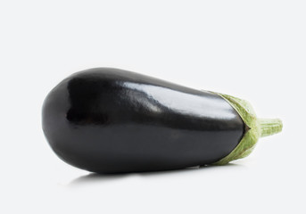 Aubergine isolated on grey background. Eggplant close up photo.