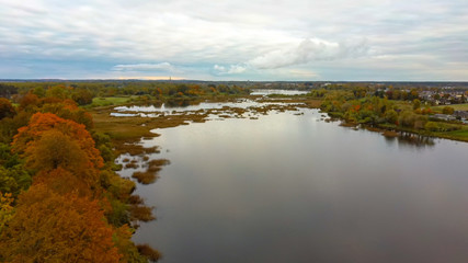 Doles Sala is  the Second Largest Island in Latvia. This is a Peninsula in the Daugava River, Near the Borders of Riga. Aerial Dron Shoot. Sunny Autumn Day.