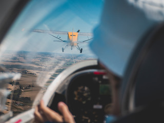 Airplane towing a glider, view from inside