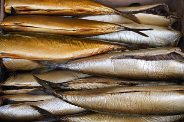 appetizing cold smoked mackerel for sale in a fish shop