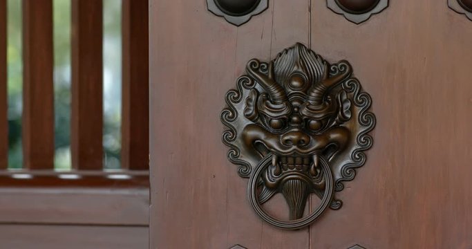 Lion head door handle in Chinese temple