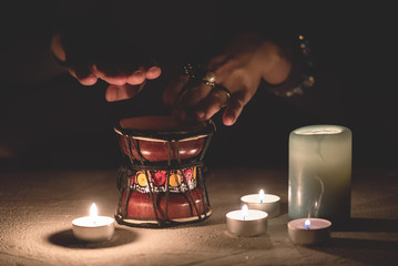 Magic drum and shaman hands close up.