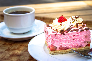Aachen, Germany - Afternoon Time with Coffee Cup and Colorful Strawberry Cake in Germany. Relaxing...