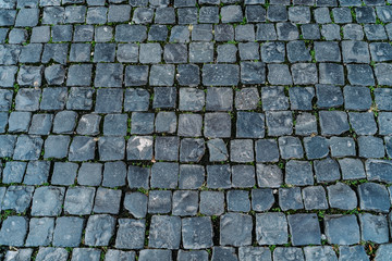 Paving stone texture, old Rome street top view as background for design.