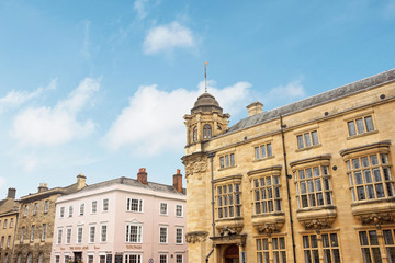 Fototapeta na wymiar Exterior of Oxford Martin School building in blue sky
