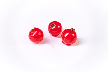 Fresh washed berries of red currant.with water drops on the background
