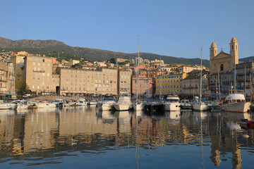 Fototapeta premium View of St Jean Baptiste cathedral and old port of Bastia ,second largest corsican city and main entry point to the island