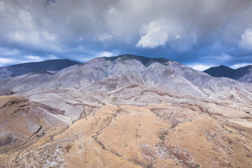 Aerial view of rock formation covered in clouds, West Maui, Hawai, USA