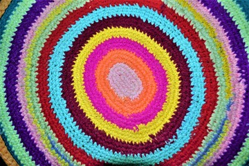 multicolored round handmade rug close up