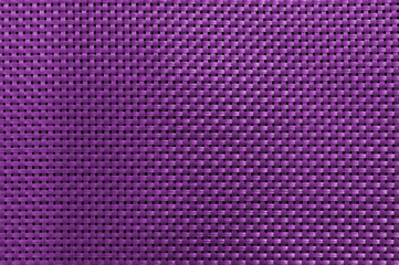 dark purple abstract interwoven texture of plastic strings