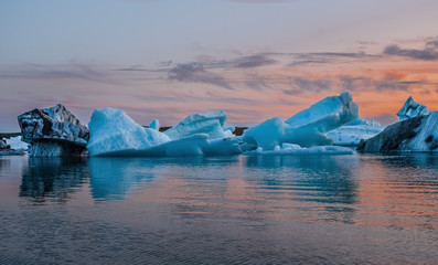Blue icebergs floating in the jokulsarlon lagoon in Iceland in the september 2019