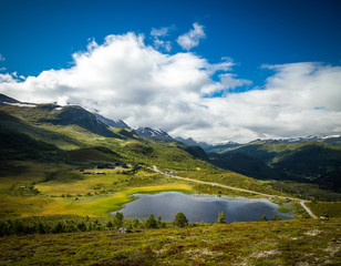 Mountain lake in Jotunheimen National Park, summer hildays.