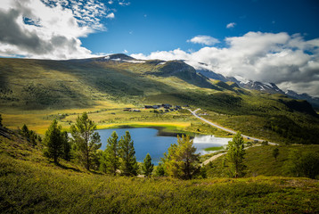 Fototapeta premium Mountain lake in Jotunheimen National Park, summer hildays.