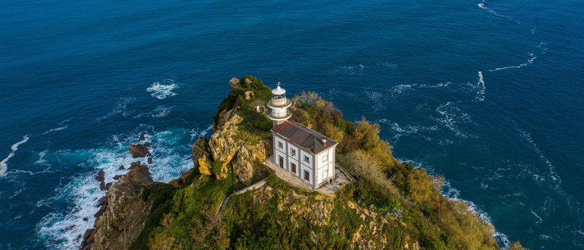 Getaria lighthouse in Gipuzkoa, Basque country - drone aerial view