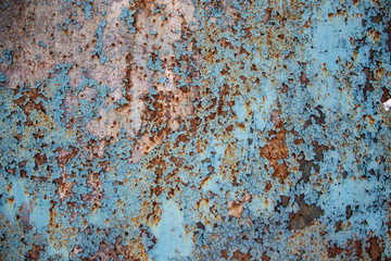 Rusty background. Shabby. Blue background. Rust. Vintage. Interesting texture.