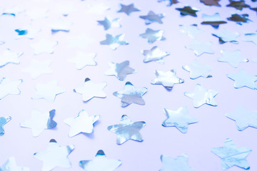 Fototapeta premium background from shiny confetti in classic blue