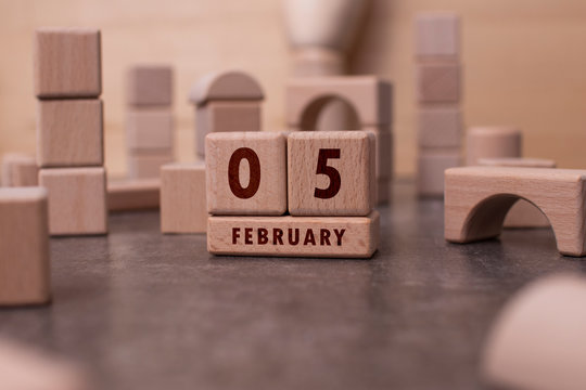 February 5 written with wooden blocks