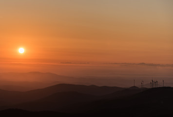 wind turbines in the clouds