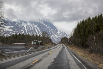 The winding road laid among the mountains and the ocean