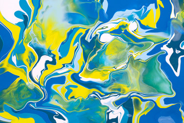  Blue and yellow acrylic liquid paint abstract surface