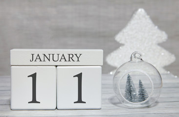 First month of the year, a calendar with numbers and a month, January 11. New Year's fairy tale as a keepsake.