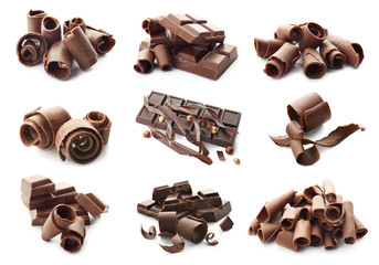 Pieces of chocolate with curls on white background