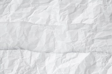 white and gray crumpled paper texture background. crush paper so that it becomes creased and wrinkled.