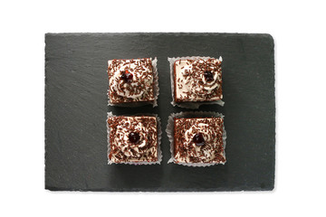 chocolate cake slices on gray texture background - isolated - 