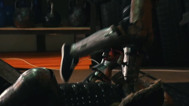Knights training - men having a fight - one man flips another to the floor