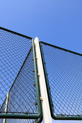 Metal protective net in blue sky background