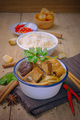 malaysian bak kut teh stew of pork with chinese herb soup and rice.