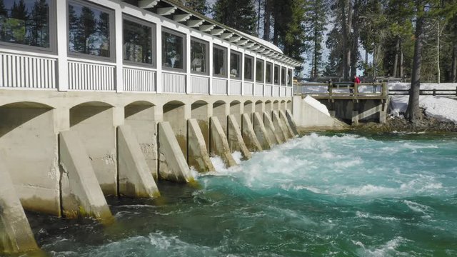Aerial: Flying over a fresh water catchment on the Truckee River in Tahoe city. Lake Tahoe, USA