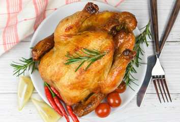 Whole roasted chicken rosemary and chilli lemon / Baked chicken grilled barbecue delicious food on dining table at holiday celebrate