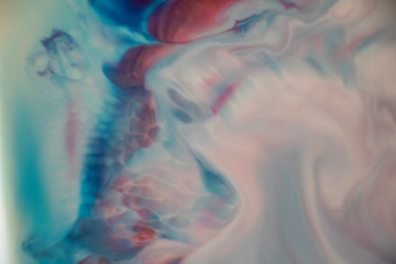 Soft Red, Blue and Purple Dreamscape Abstract Background Soft and beautiful artistic liquid art. Mountains, rivers and oceans of soft colors. Similar to the art style of Georgia O`keeffe. Floating 