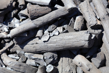 Charcoal piles up