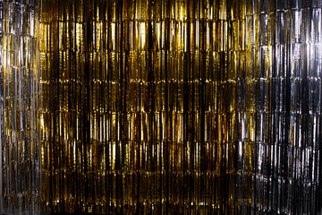 Gold Foil strip Curtain hanging on wall