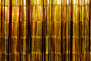 Gold Foil strip Curtain hanging on wall